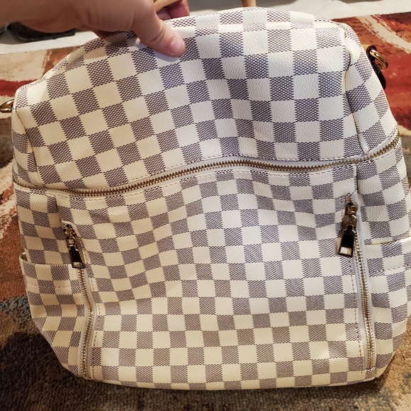 white checkered backpack